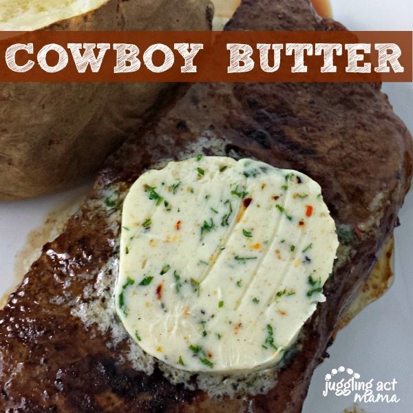Close up image of cowboy butter slice on top of a steak.
