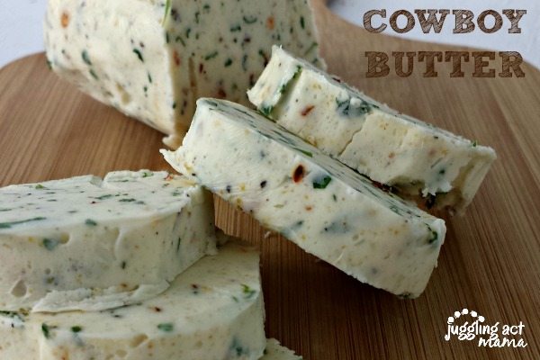 Homemade Cowboy Butter on a wooden cutting board.