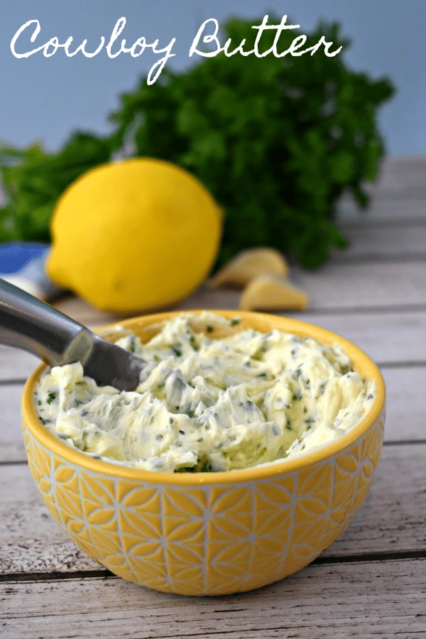 Easy Cowboy Butter Recipe: cowboy butter in a small dish with a butter knife.