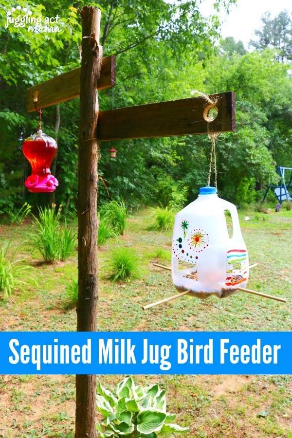 This simple tutorial will show you how to make your own Milk Jug Bird Feeder for a fun and easy upcycle craft to keep boredom at bay! via @jugglingactmama