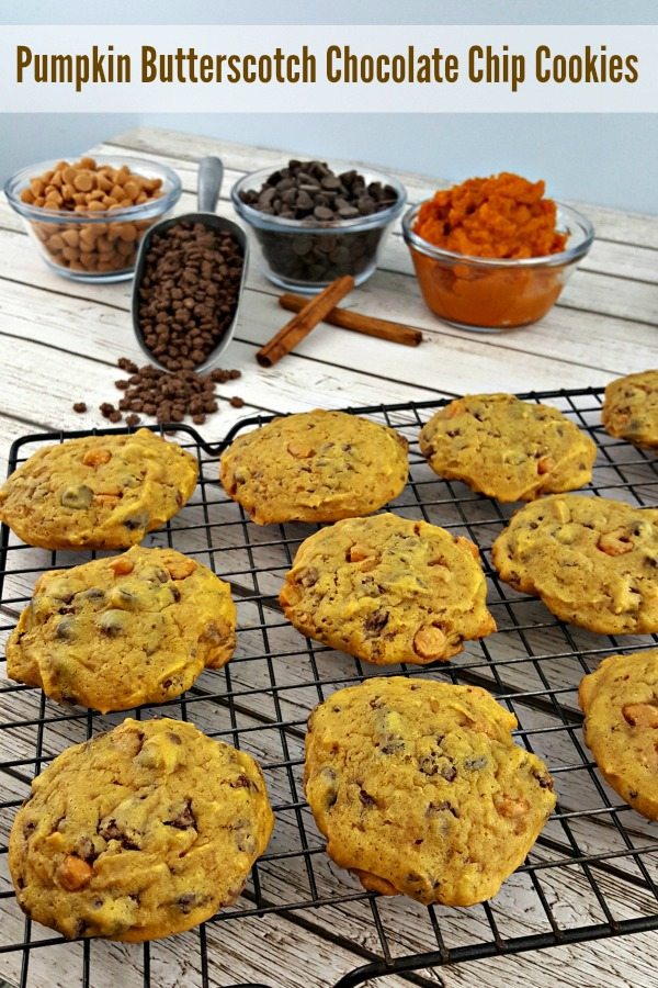 Pumpkin butterscotch cookies on a cooling rack in front of scoops and small bowls of ingredients.