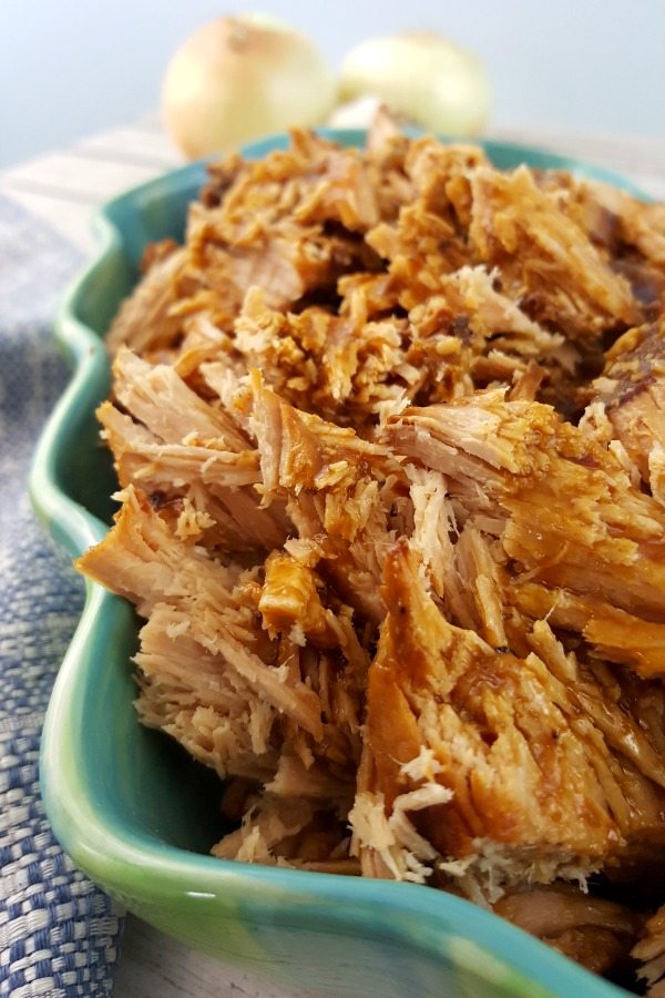 Classic Slow Cooker Pulled Pork Recipe - close up of pulled pork