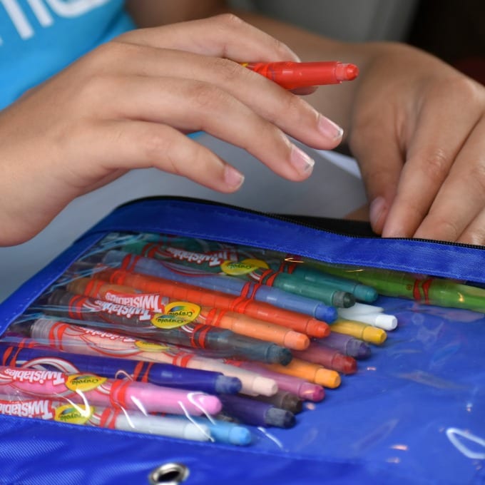 Crayons in a blue pencil bag