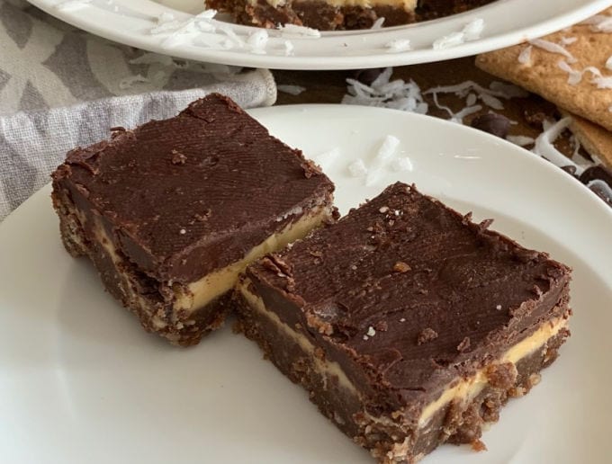 2 Nanaimo bars on a white plate