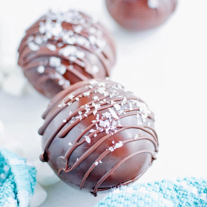 Close up image of salted caramel hot cocoa bombs.