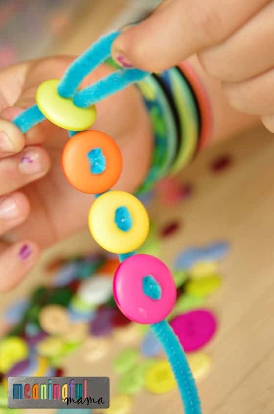 Bracelets made using pipe cleaners and buttons.