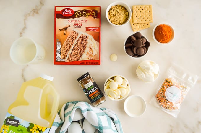 Ingredients to make pumpkin spice truffles on a countertop.