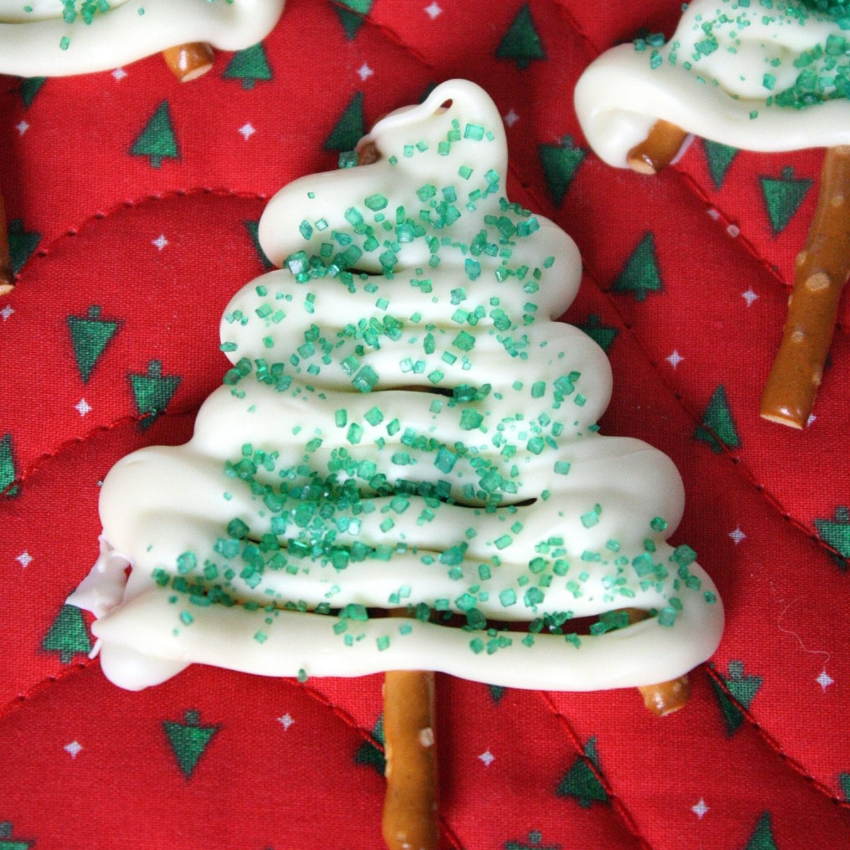 Close up of white chocolate Christmas Pretzel Trees.
