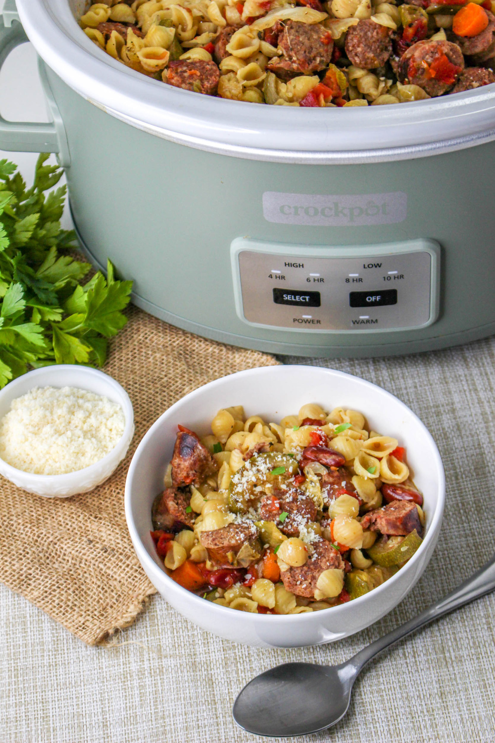 You'll love this easy Slow Cooker Sausage Stew! With bold flavors and tons of veggies, this comforting soup will fill you up and warm you up, too. via @jugglingactmama