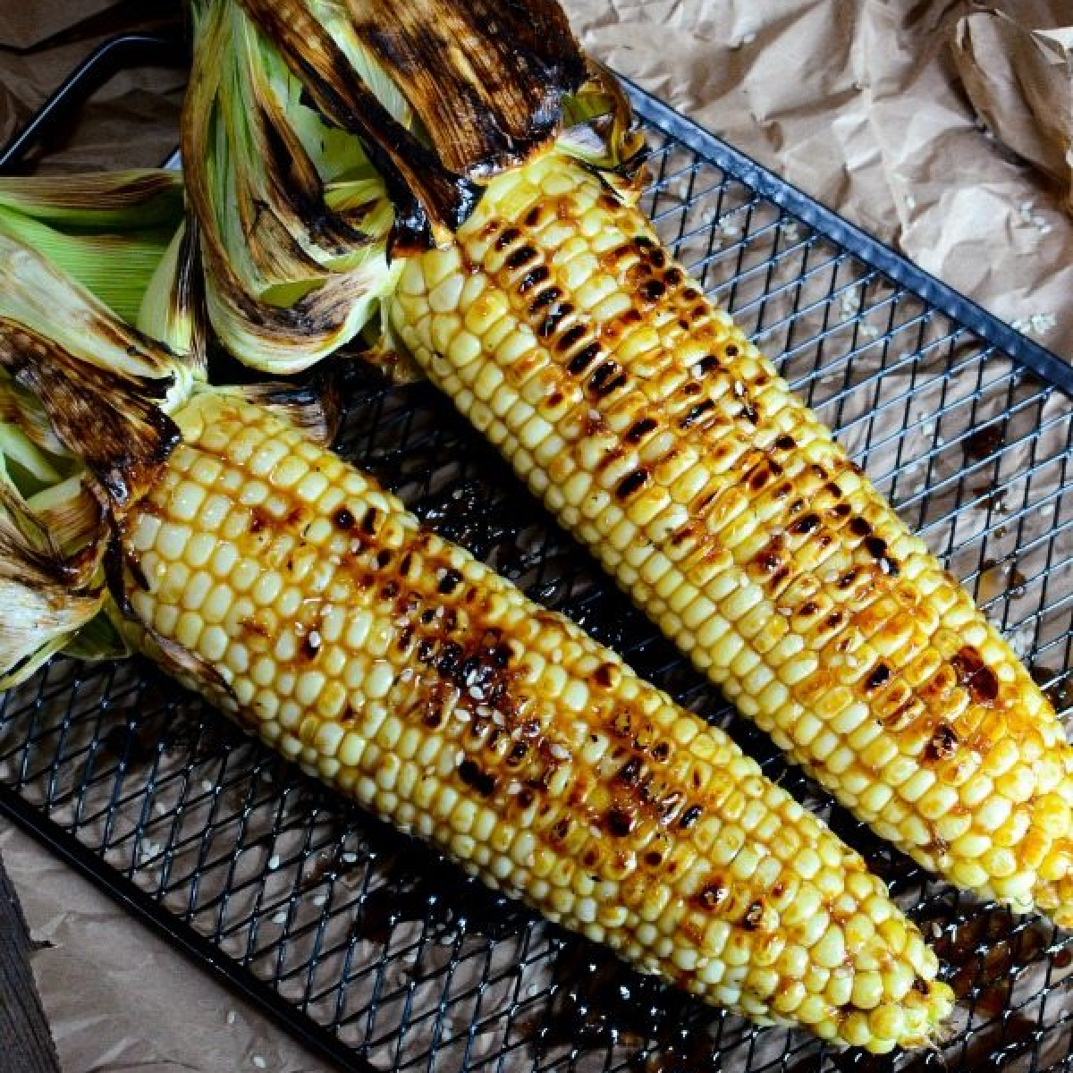 Ginger Soy Grilled Corn on a wire rack.