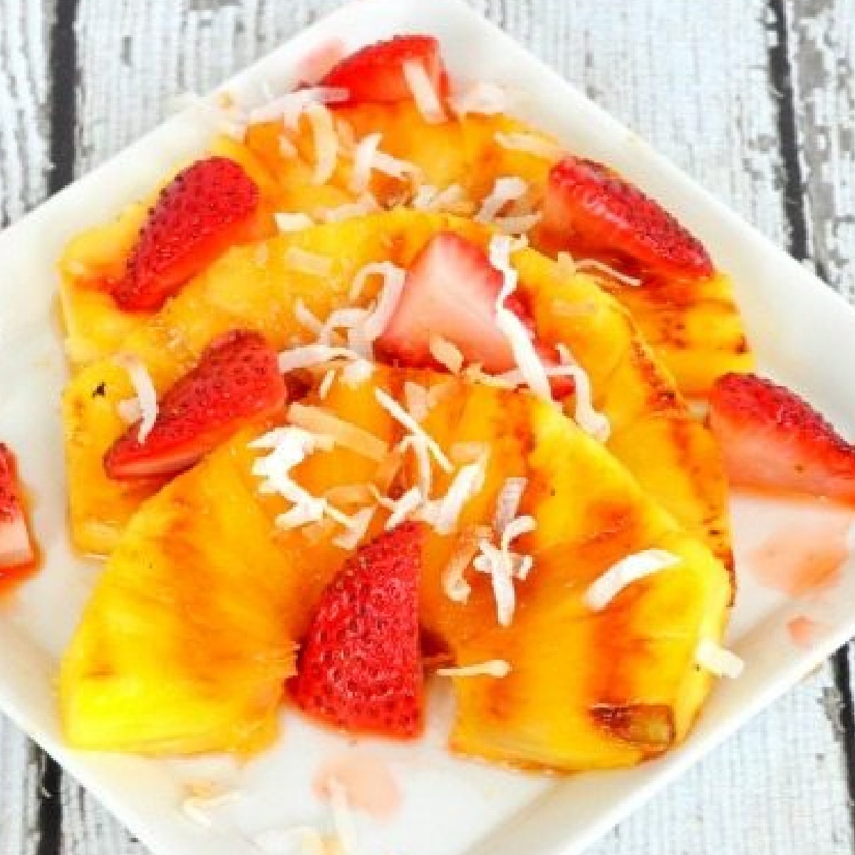 Grilled Pineapple Fruit Salad with strawberries.