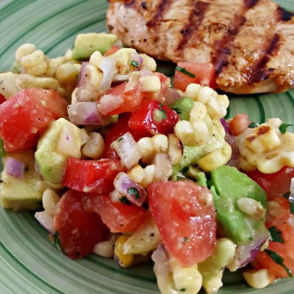 Close up of Corn Tomato Avocado Salsa on a plate.