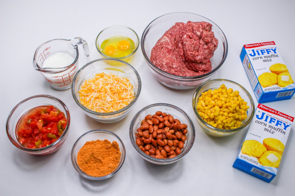 Beefy Corn Casserole Ingredients in bowls on a countertop.