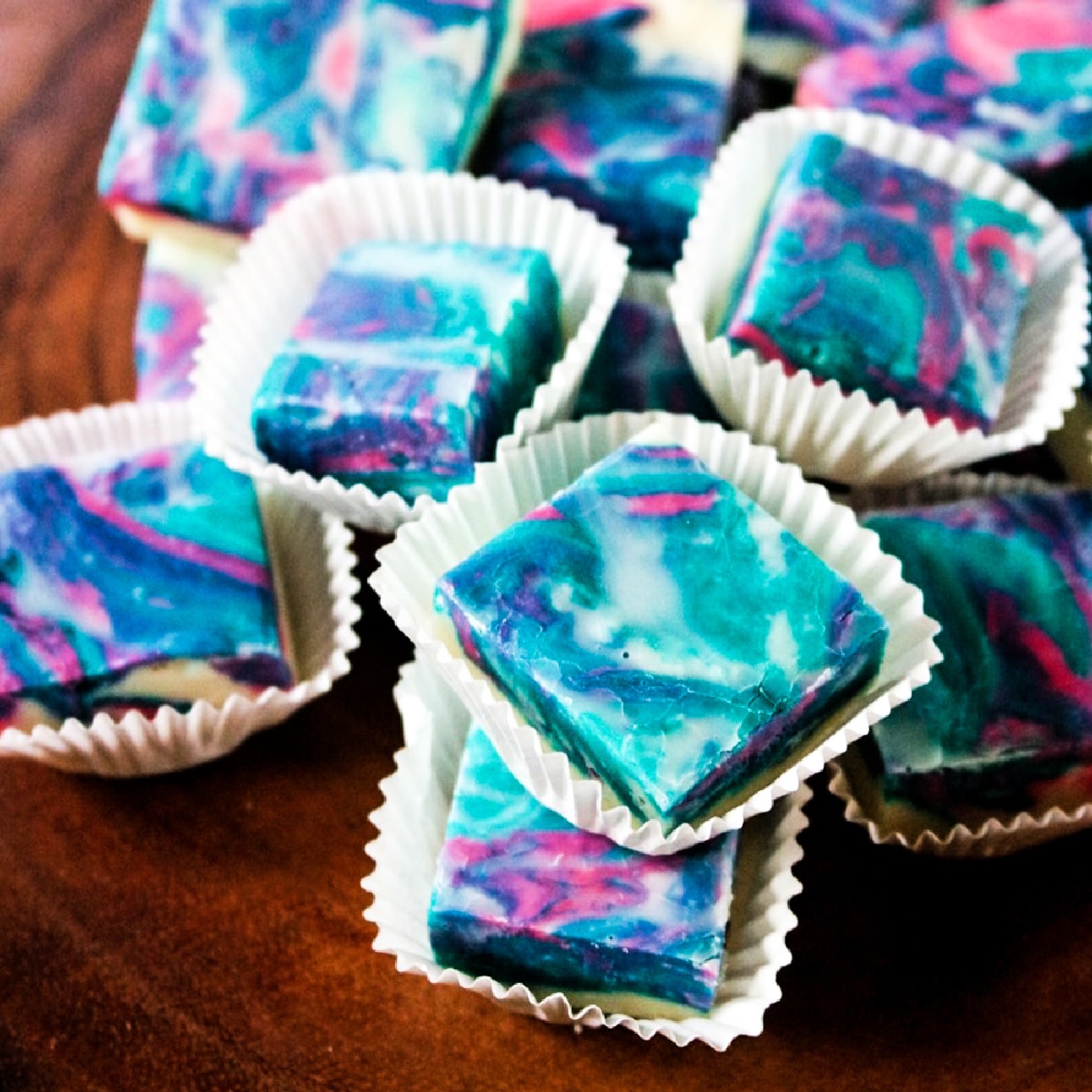 Squares of Cotton Candy Fudge on a platter.