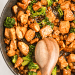 30 Minute Meals: Chicken and Broccoli Stir Fry in a skillet with a spoon.
