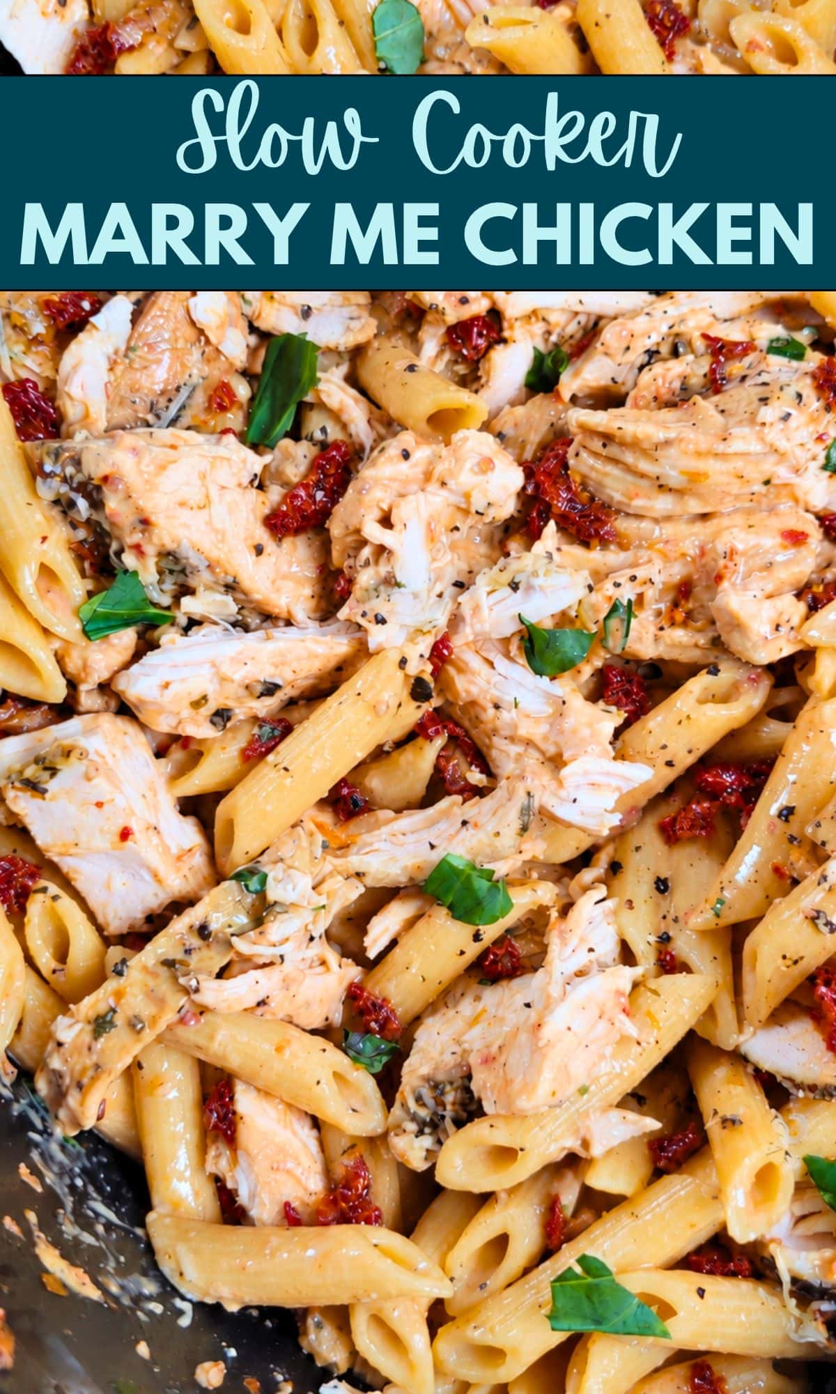 Penne pasta with shredded chicken, sun-dried tomatoes, and fresh herbs in a creamy sauce, with the text Slow Cooker Marry Me Chicken at the top.